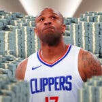 P.J. Tucker surrounded by piles of cash.