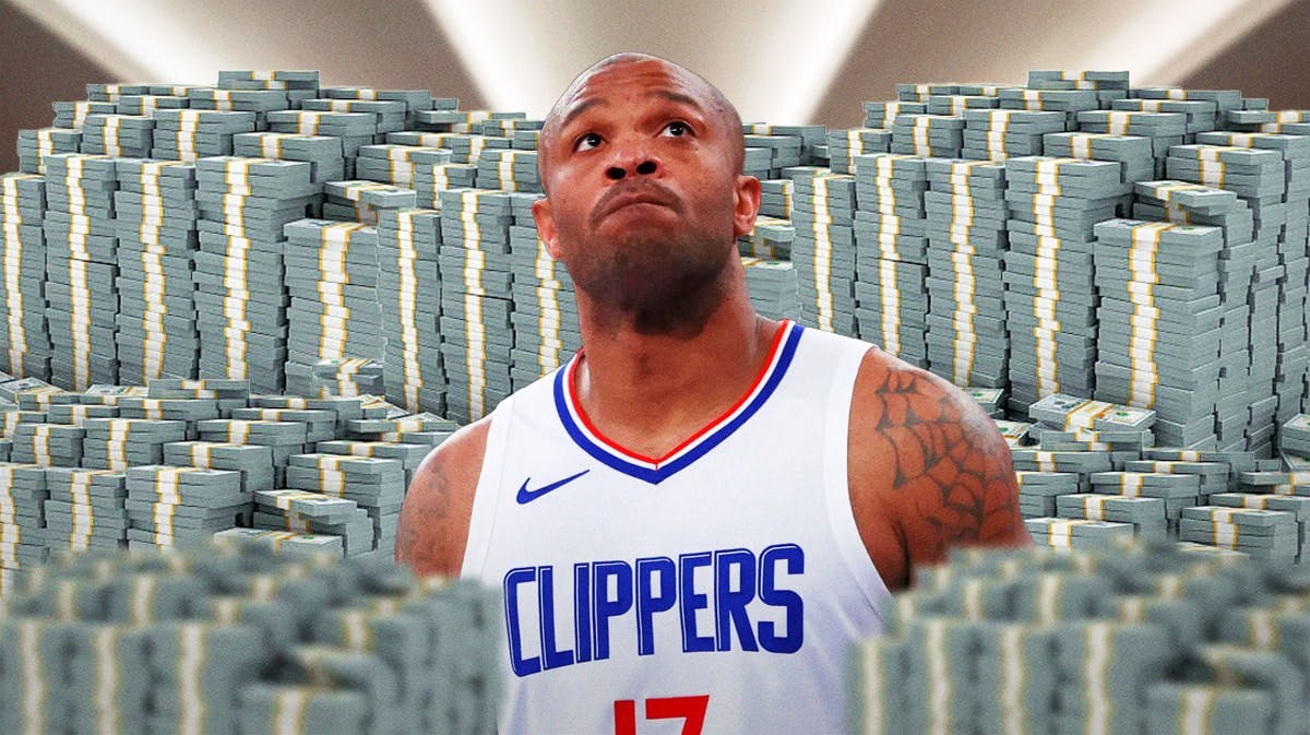 P.J. Tucker surrounded by piles of cash.