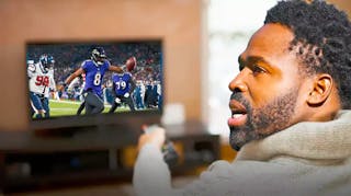 Torrey Smith watching Ravens qb Lamar Jackson on TV