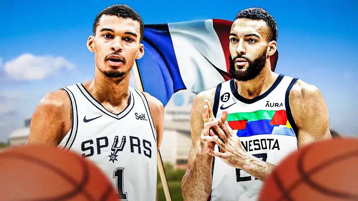 San Antonio Spurs rookie Victor Wembanyama and Minnesota Timberwolves center Rudy Gobert with the French flag flying behind them