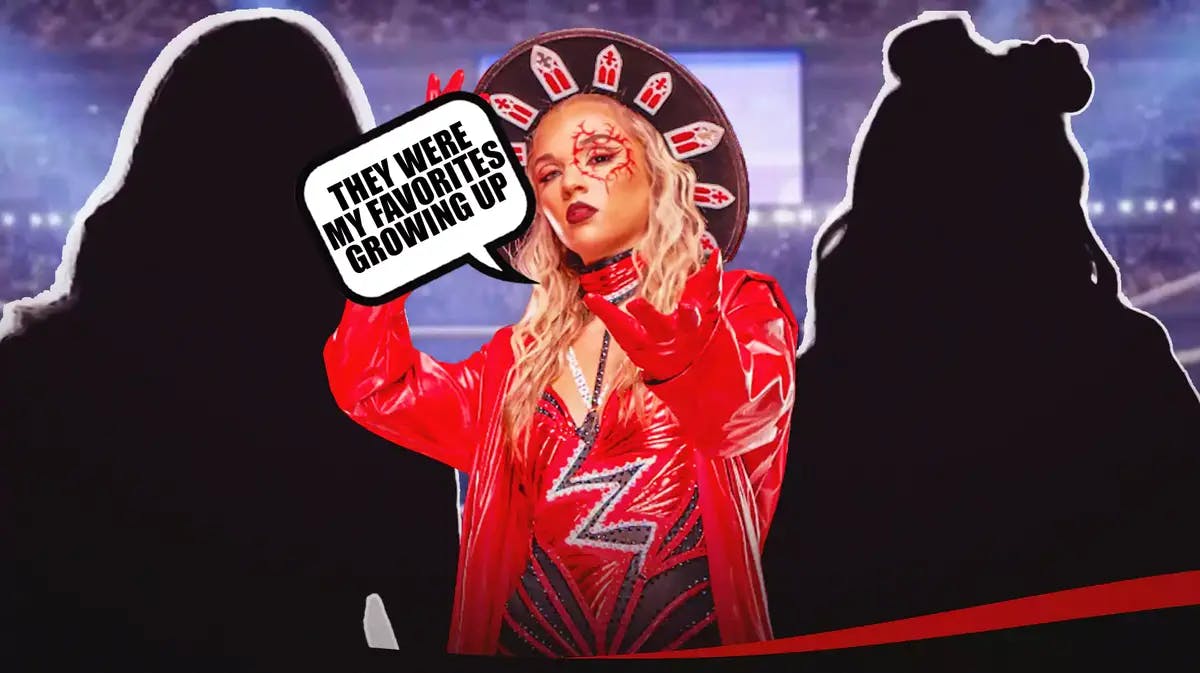 2023 Julia Hart with a text bubble reading “They were my favorites growing up” in a wrestling ring with the blacked-out silhouette of AJ Lee on her left and the blacked-out silhouette of Alexa Bliss on her right.