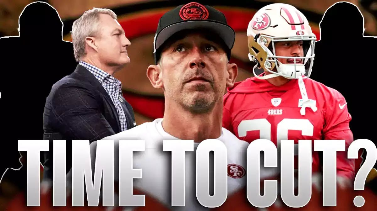 Kyle Shanahan, John Lynch, Isaiah Oliver all beside each other, and San Francisco 49ers wallpaper in the background.