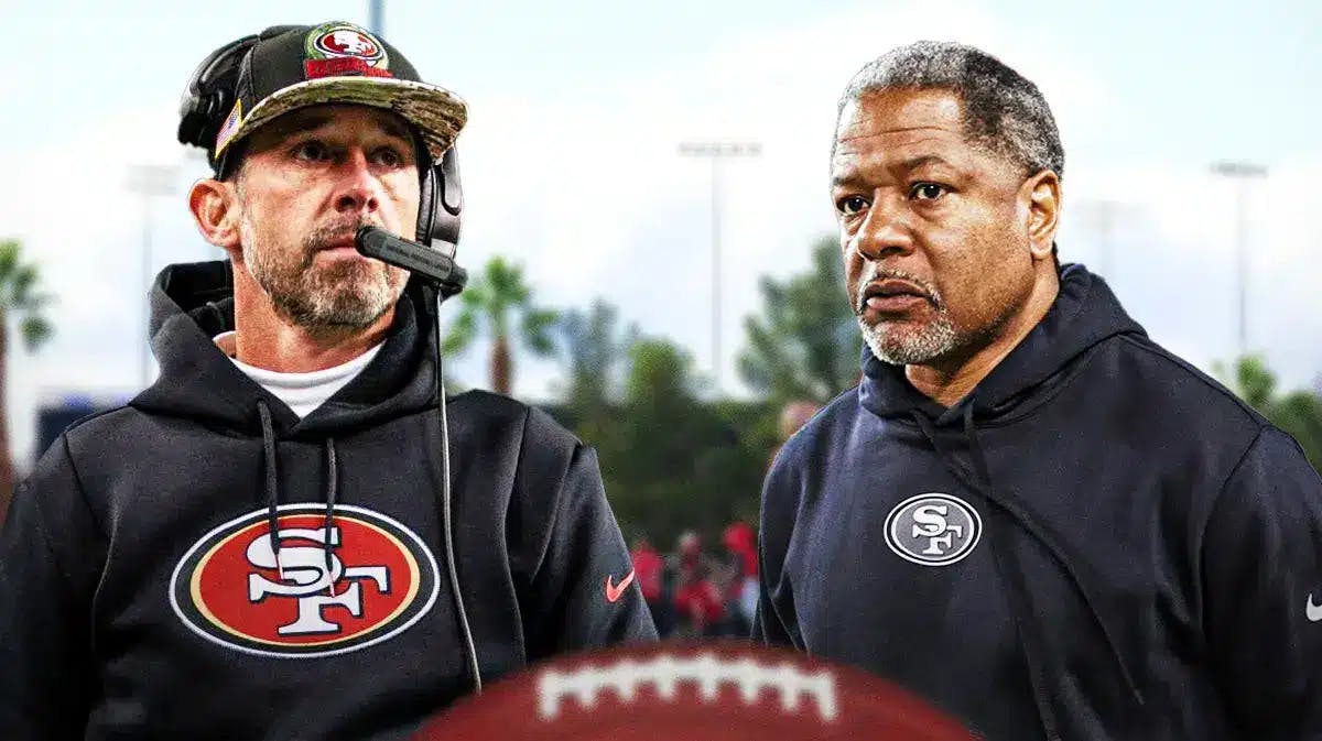 San Francisco 49ers coaches Kyle Shanahan and Steve Wilks in front of Levi's Stadium.