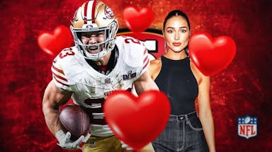 49ers' Christian McCaffrey stands next to Olivia Culpo after her wedding hints