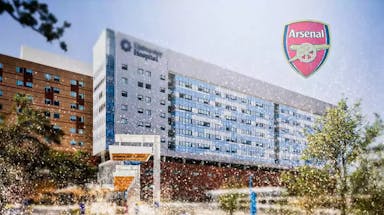 A hospital, the Arsenal logo in the sky