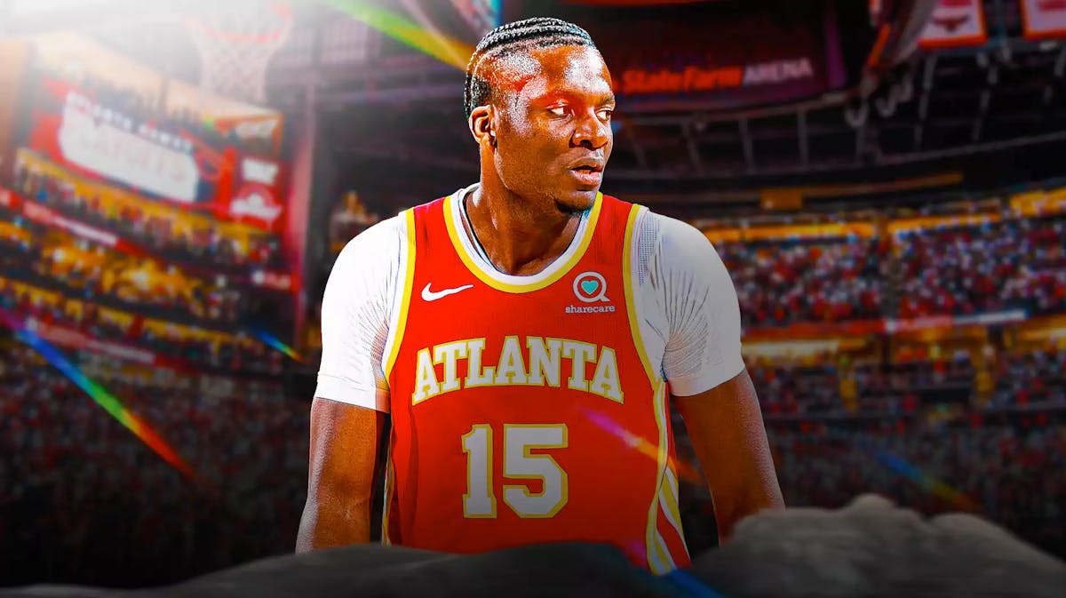 Clint Capela with the Hawks arena in the background, injury
