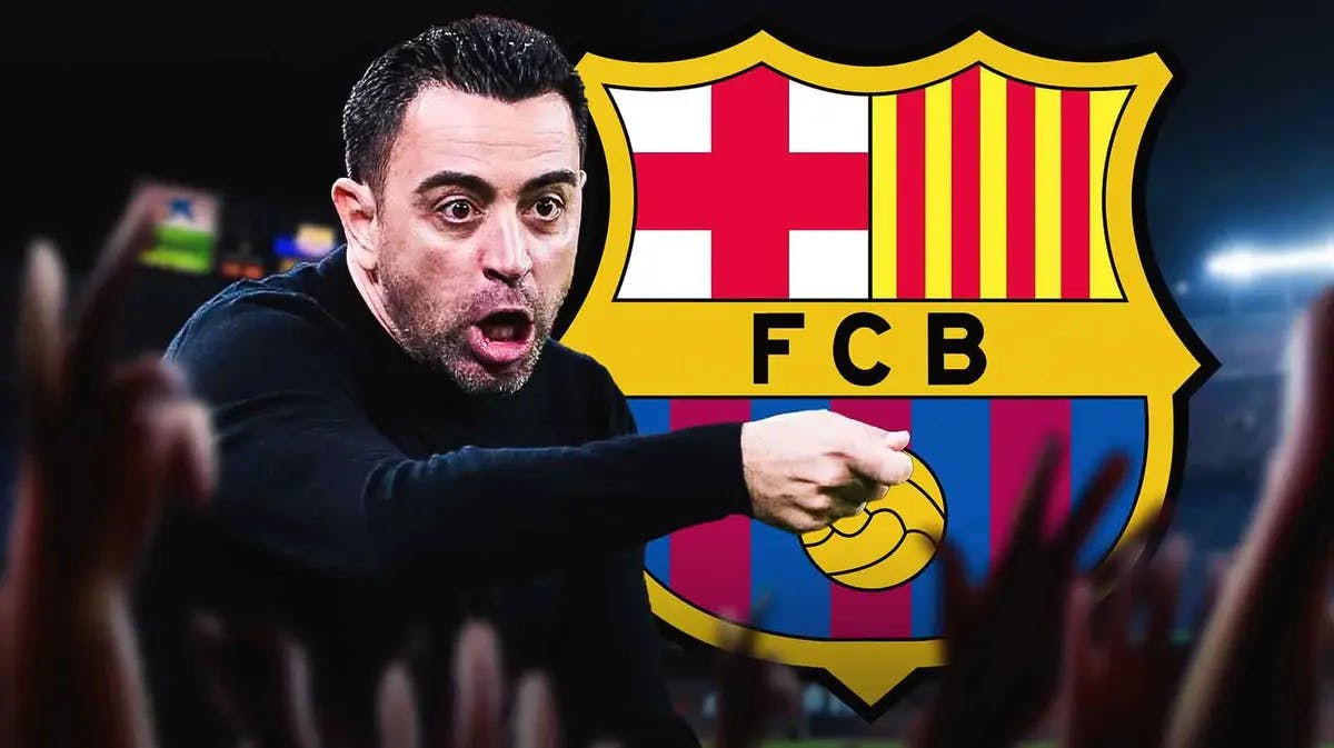 Xavi Hernandez shouting in front of the FC Barcelona logo
