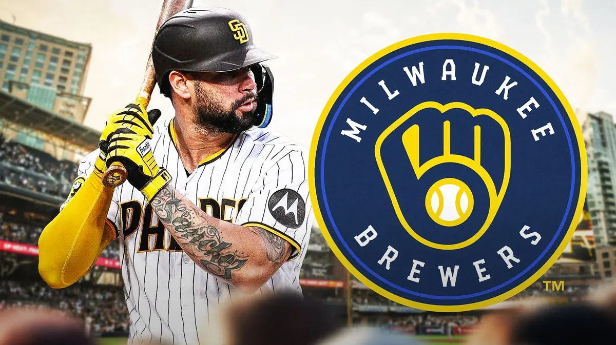 Former San Diego Padres catcher Gary Sanchez stands next to Milwaukee Brewers logo amid contract negotiations