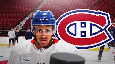 Jayden Struble in middle of image looking stern, first aid kit, MTL Canadiens logo, hockey rink in background
