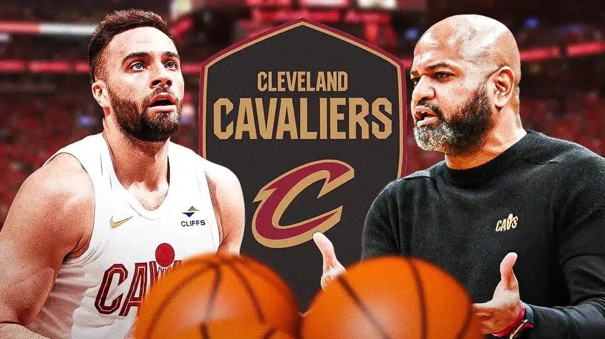 Max Strus and JB Bickerstaff next to a Cavs logo at Scotiabank Arena