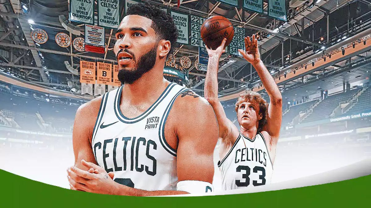 Jayson Tatum alongside Larry Bird with the Celtics arena in the background