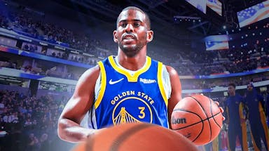 Chris Paul with the Warriors arena in the background, injury