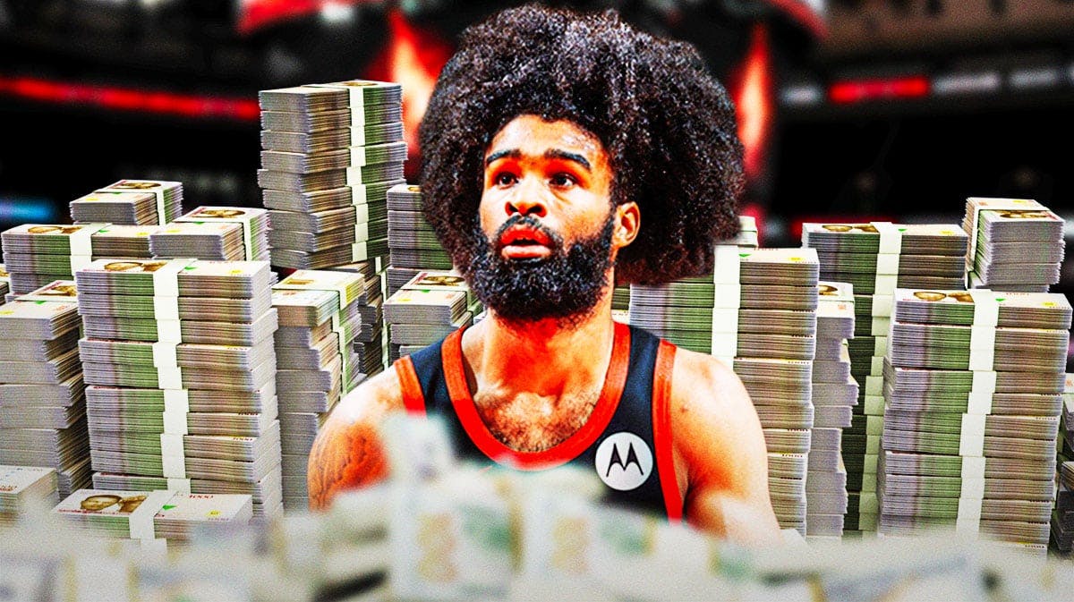 Coby White surrounded by piles of cash.