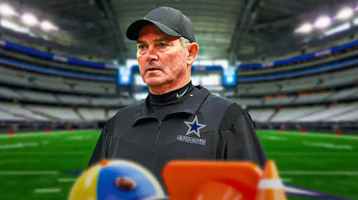 New Cowboys defensive coordinator Mike Zimmer, A&T Stadium in back