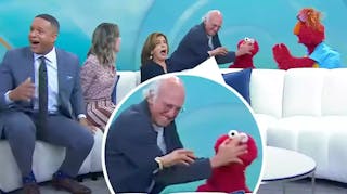 Screen shot of Larry David attacking Elmo live on the Today Show