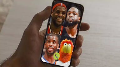LeBron James, Dwyane Wade, Chris Paul, and the Heat mascot in a group call (head shots)