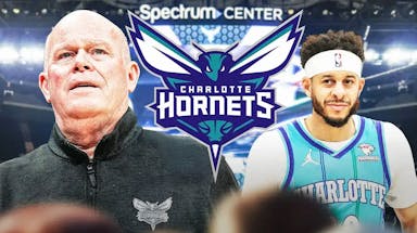 Steve Clifford and Seth Curry next to a Hornets logo at the Spectrum Center