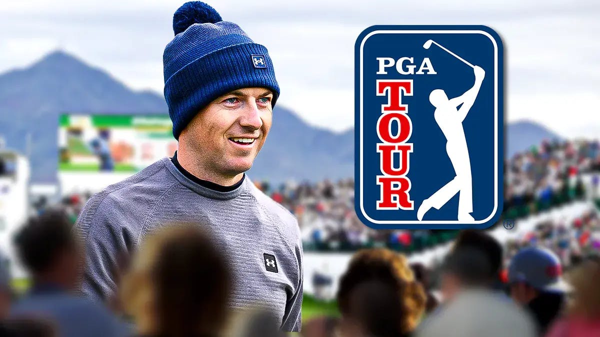 Jordan Spieth stands next to PGA Tour logo on the WM Phoenix Open golf course