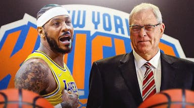 Former New York Knicks star Carmelo Anthony and Phil Jackson in front of the team's logo.
