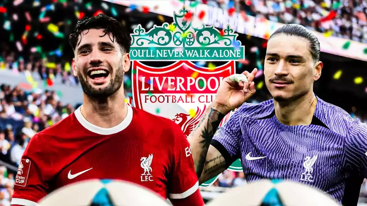 Darwin Nunez and Dominik Szoboszlai celebrating in front of the Liverpool logo