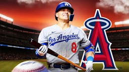 Kike Hernandez in a Dodgers uniform (2023) smiling, with Angels logo beside him