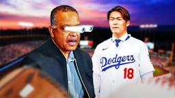 Yoshinobu Yamamoto in a Dodgers jersey next to Dave Roberts. Have Roberts' eyes popping