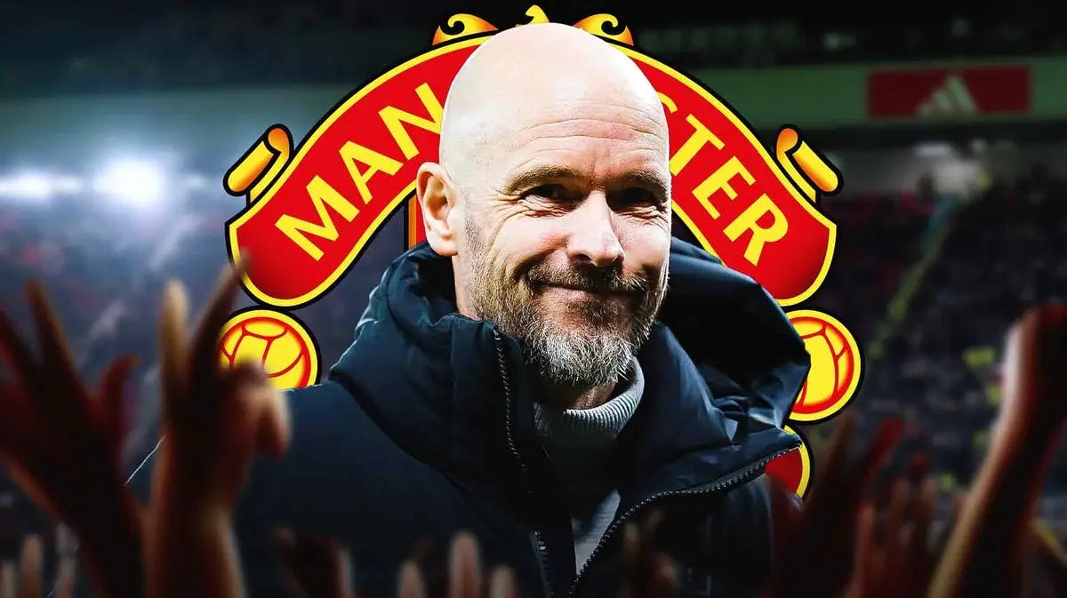 Erik ten Hag smiling in front of the Manchester United logo