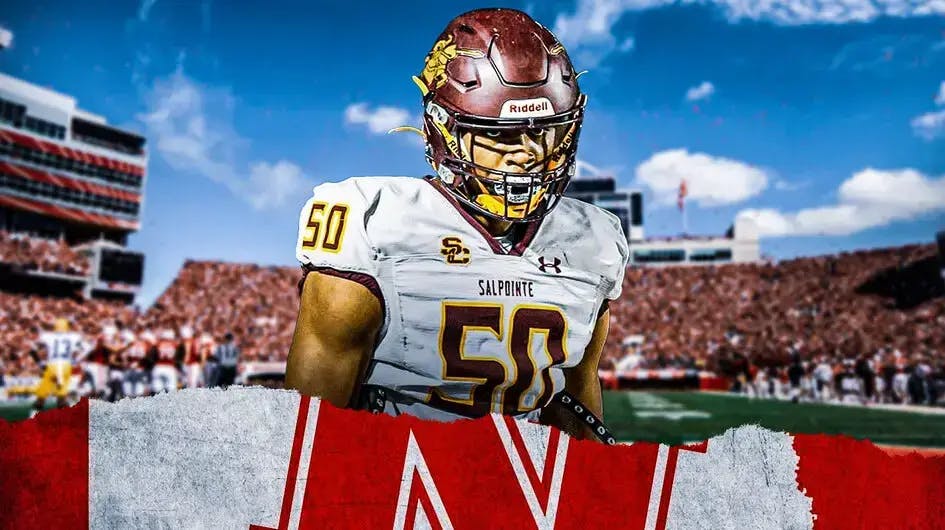 Keona Wilhite stands in front of Nebraska football crowd after his On3 recruitment, Matt Rhule coaches on the sidelines out of sight