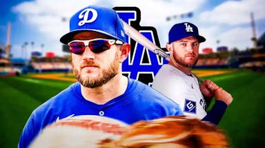 Max Muncy in front of a Dodgers logo at Dodger Stadium