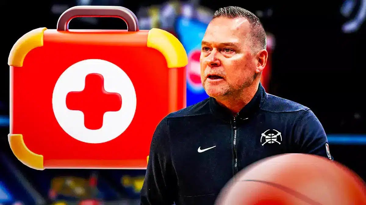 Nuggets head coach Michael Malone next to a first aid kit