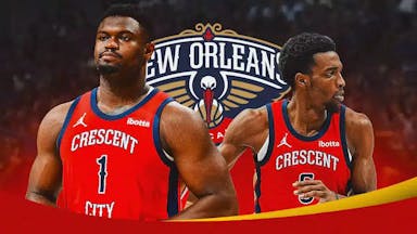 Zion Williamson and Herb Jones next to a Pelicans logo