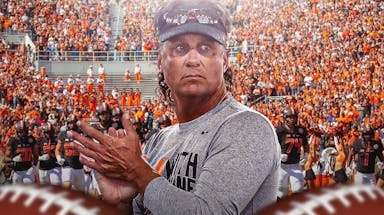 Oklahoma State football coach Mike Gundy clapping his hands.
