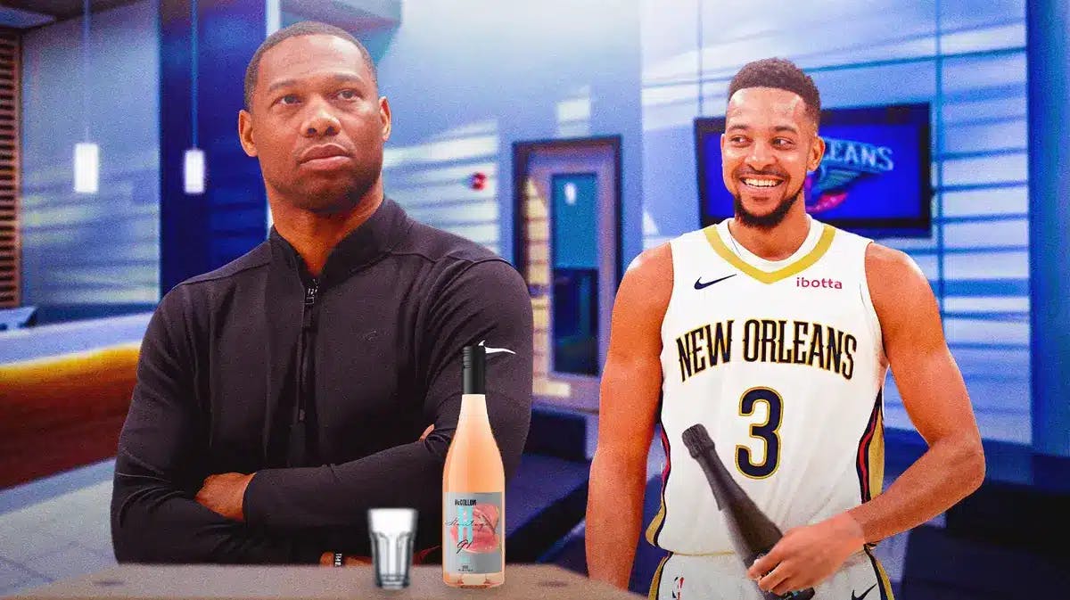 Pelicans Willie Green and CJ McCollum holding wine bottles