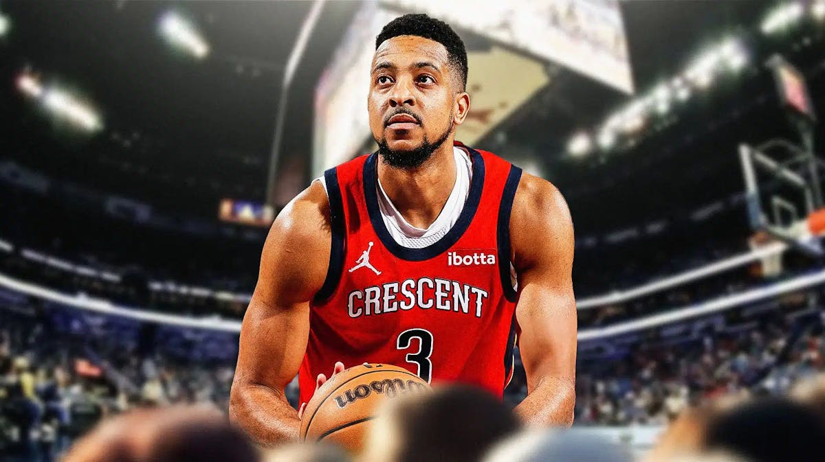 CJ McCollum with the Pelicans arena in the background, injury