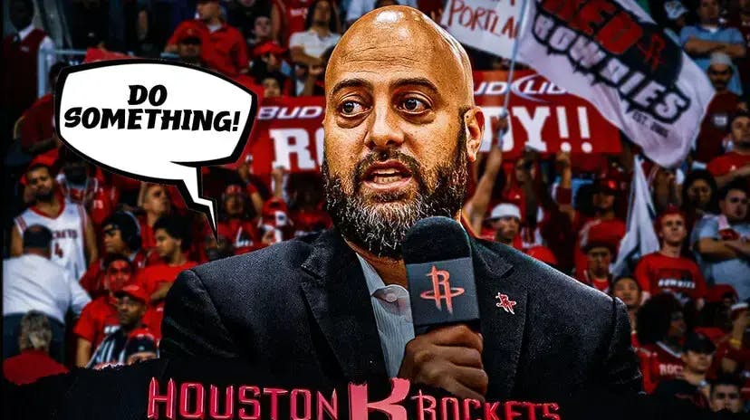 Rockets Rafael Stone sitting down with fans behind them saying “DO SOMETHING!”
