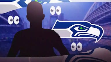Silhouette coach next to the Seahawks logo