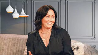 Shannen Doherty sending on the couch