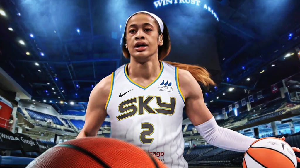 Chennedy Carter in a Chicago Sky jersey with the Sky arena in the background