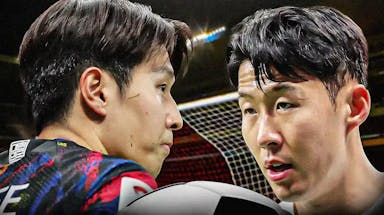 Son Heung-min and Lee Kang-in shouting towards each other in front of the Asian Cup logo