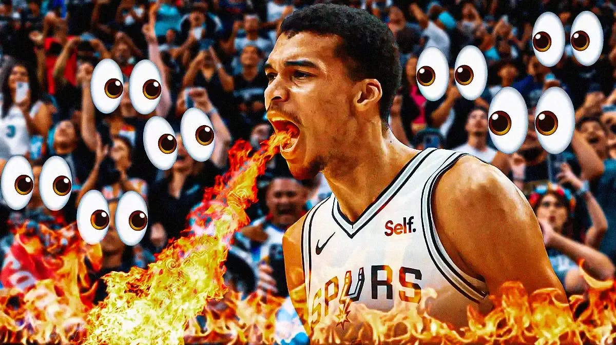 Victor Wembanyama on one side breathing fire, a bunch of San Antonio Spurs fans on the other side with the big eyes emoji over their faces