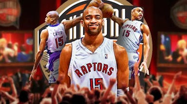 Photo: Vince Carter in Raptors jersey smiling, Naismith Basketball Hall of Fame as background