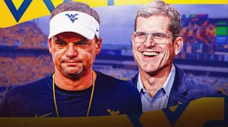 West Virginia Mountaineers HC Neal Brown with former Michigan HC Jim Harbaugh