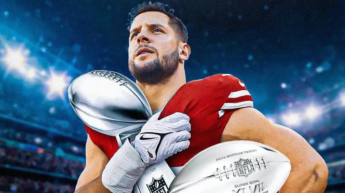 49ers' Nick Bosa holding Super Bowl MVP.