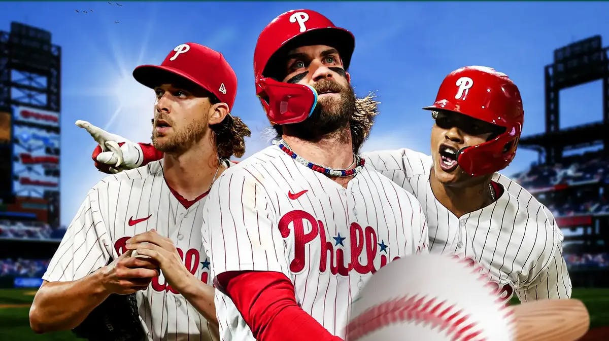 Phillies' Bryce Harper in middle, Phillies' Aaron Nola on left, Phillies' Christian Pache on right.