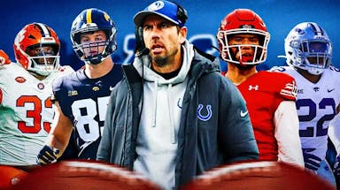 Coach Shane Steichen in the middle, Cole Bishop, Daniel Green, Ruke Orhorhoro, Logan Lee around him, and Indianapolis Colts wallpaper in the background.