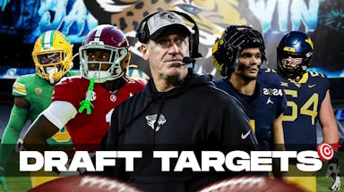 Coach Doug Pederson in the middle, Kool-Aid McKinstry, Bucky Irving, Roman Wilson, Zach Frazier around him, and Jacksonville Jaguars wallpaper in the background.