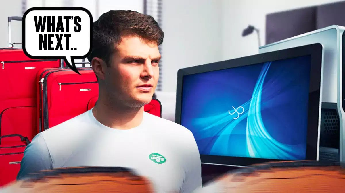 Jets' Zach Wilson looking at a computer