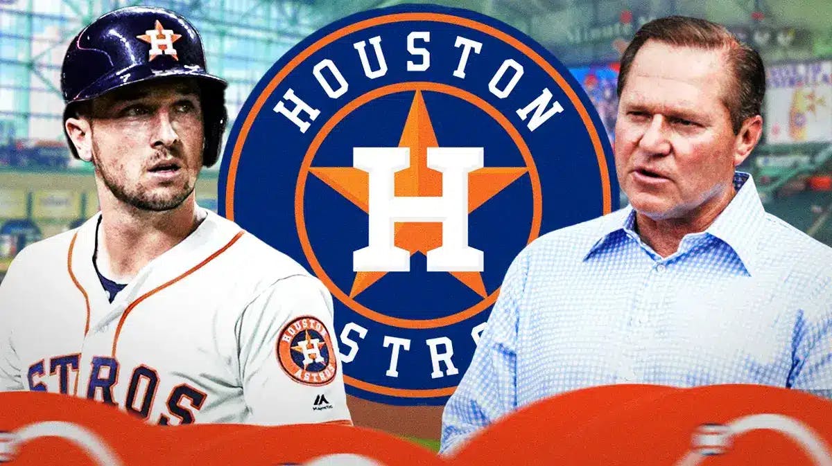 Alex Bregman and Scott Boras in front of an Astros logo at Minute Maid Park