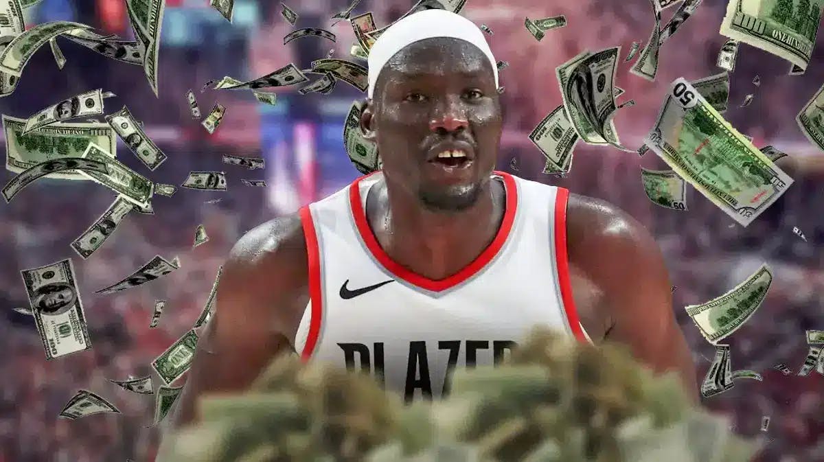 Blazers center Duop Reath surrounded by cash