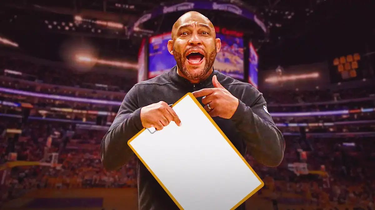 Lakers coach Darvin Ham holding a clipboard